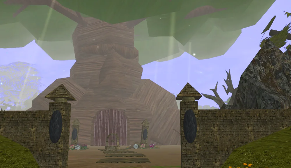 A large tree that appears to have a grandfatherly face rises above the surrounding forest