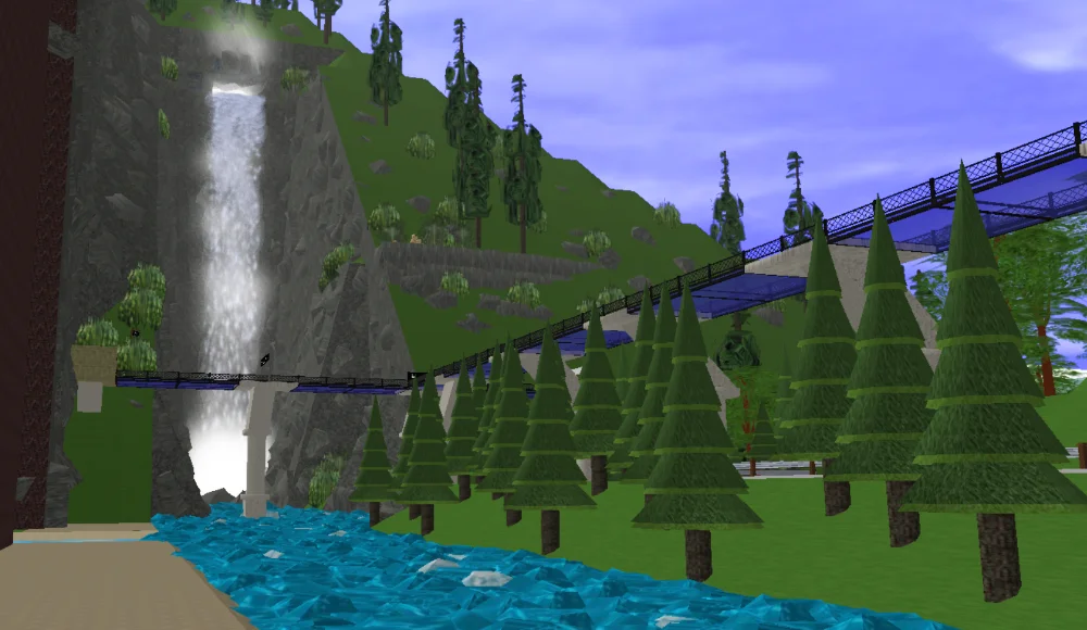 A large waterfall plunges out of a cliffside cave and into a raging river hundreds of meters below.