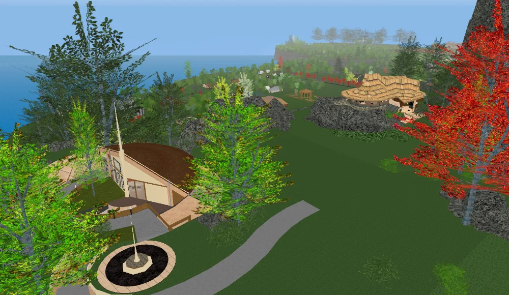 A postmodern home shaped like a circle sits on a mountainside with the landscape and ocean spreading out behind it